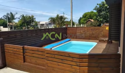 casa com dois dormitórios sendo um suite em Nova Tramandai!!!!