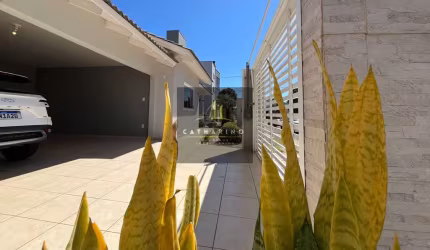 CASA COM 03 SUÍTES