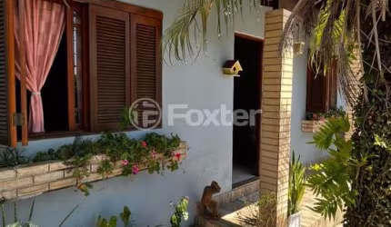 Casa com 3 quartos à venda na Rua das Adálias, 372, Cecília, Viamão, 180 m2 por R$ 477.000