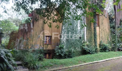 Casa com 4 quartos à venda na Avenida Senador Salgado Filho, 2588, Santa Cecília, Viamão, 554 m2 por R$ 1.100.000