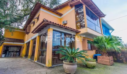 Casa com 4 quartos à venda na Rua Palermo, 105, Santa Isabel, Viamão, 360 m2 por R$ 600.000