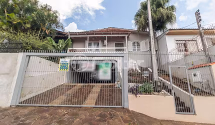 Casa com 3 quartos à venda na Rua Vital Brasil, 69, Jardim Itu Sabará, Porto Alegre, 120 m2 por R$ 650.000