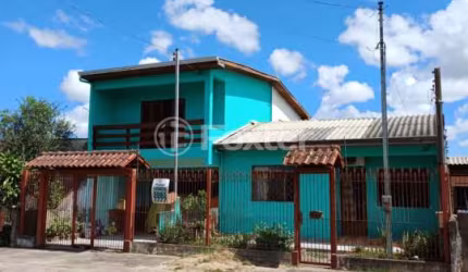 Casa com 3 quartos à venda na Rua Taimbé, 414, Sumaré, Alvorada, 205 m2 por R$ 389.900