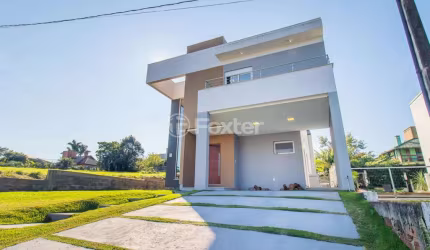 Casa em condomínio fechado com 3 quartos à venda na Rua Capororoca, 28, São Lucas, Viamão, 172 m2 por R$ 980.000