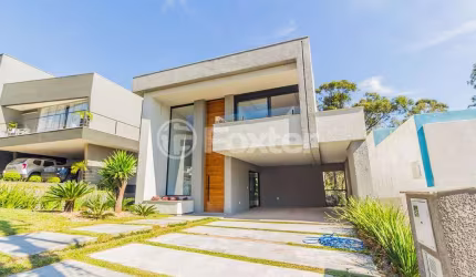 Casa em condomínio fechado com 3 quartos à venda na Avenida Senador Salgado Filho, 8500, Querência, Viamão, 215 m2 por R$ 1.800.000