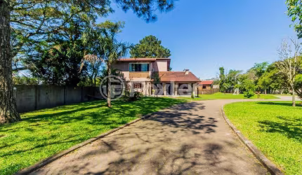 Casa com 4 quartos à venda na Rua Portela, 40, Florescente, Viamão, 358 m2 por R$ 949.000
