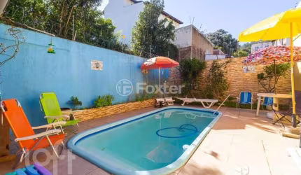 Casa com 3 quartos à venda na Rua Manoel Nunes da Silva, 20, Guarujá, Porto Alegre, 174 m2 por R$ 640.000