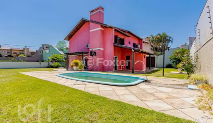 Casa com 3 quartos à venda na Rua Bélgica, 26, Marechal Rondon, Canoas, 270 m2 por R$ 2.100.000
