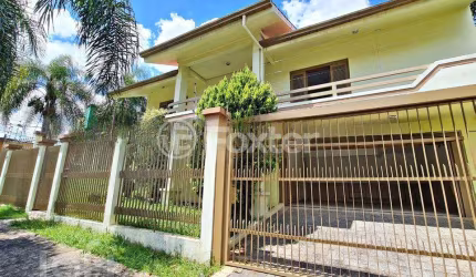 Casa com 5 quartos à venda na Rua Canela, 14, Ouro Branco, Novo Hamburgo, 262 m2 por R$ 1.200.000