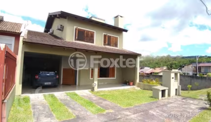 Casa em condomínio fechado com 3 quartos à venda na Rua Erny Ludwig, 135, Mário Quintana, Porto Alegre, 270 m2 por R$ 897.000