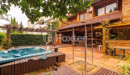 Casa com 3 quartos à venda na Rua Licínio Cardoso, 300, Chácara das Pedras, Porto Alegre, 427 m2 por R$ 3.000.000