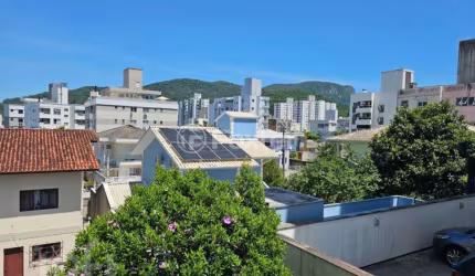 Casa com 4 quartos à venda na Rua Bolonha, 130, Pagani, Palhoça, 242 m2 por R$ 1.200.000
