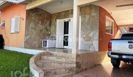 Casa com 3 quartos à venda na Avenida João Marciano, 105, Girassol, Gravataí, 130 m2 por R$ 585.000
