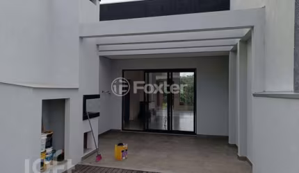 Casa com 3 quartos à venda na Rua Antônio Ramos, 675, Loteamento Jardim Timbaúva, Gravataí, 154 m2 por R$ 930.000