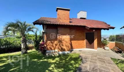 Casa com 4 quartos à venda na Rua Guaporé, 79, Primavera, Novo Hamburgo, 304 m2 por R$ 1.099.000