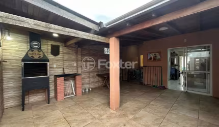 Casa em condomínio fechado com 2 quartos à venda na Rua Jozino Liotti, 300, Jardim Algarve, Alvorada, 52 m2 por R$ 200.000