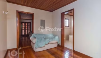 Casa com 5 quartos à venda na Rua Afonso Arinos, 475, Camaquã, Porto Alegre, 277 m2 por R$ 890.000