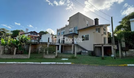 Casa em condomínio fechado com 4 quartos à venda na Rua Cangerana, 400, São Lucas, Viamão, 400 m2 por R$ 700.000