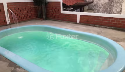 Casa com 3 quartos à venda na Avenida Tiradentes, 970, Aparecida, Alvorada, 200 m2 por R$ 515.000