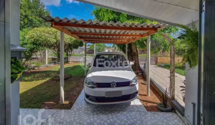 Casa com 2 quartos à venda na Rua Clóvis Beviláqua, 1545, Harmonia, Canoas, 101 m2 por R$ 339.000