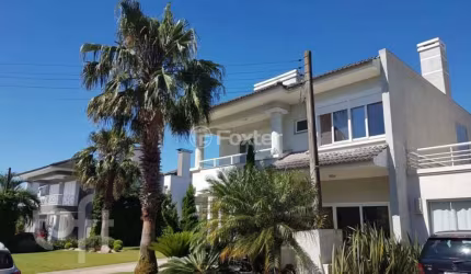 Casa em condomínio fechado com 6 quartos à venda na Avenida Central, 2000, Zona Nova, Capão da Canoa, 600 m2 por R$ 3.550.000
