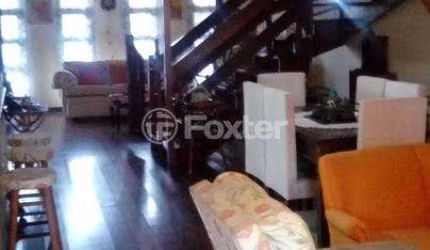 Casa com 3 quartos à venda na Avenida Guarujá, 140, Guarujá, Porto Alegre, 235 m2 por R$ 750.000