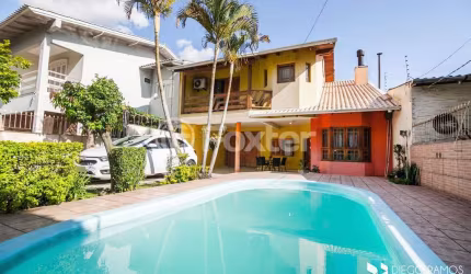 Casa com 4 quartos à venda na Rua Cacilda Yaconis Becker, 223, Rubem Berta, Porto Alegre, 300 m2 por R$ 730.000