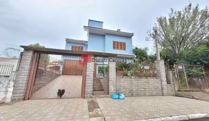 Casa com 3 quartos à venda na Rua Bolívia, São José, Canoas, 230 m2 por R$ 850.000
