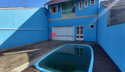 Casa com 3 quartos à venda na Rua Michigan, Mato Grande, Canoas, 97 m2 por R$ 307.000