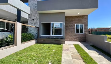 Casa 02 Dorm à venda no Bairro CAPÃO DA CANOA - 1 vaga de garagem