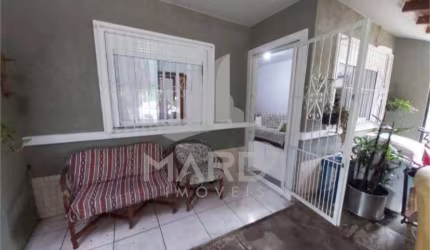 Casa com 2 quartos à venda na Rua Newton Silveira Netto, 275, Hípica, Porto Alegre por R$ 240.000