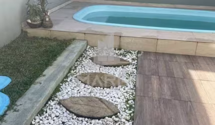 Casa com 3 quartos à venda na Rua Claudio da Silva Pinto, 484, Guarujá, Porto Alegre por R$ 660.000