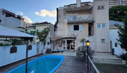 Casa com 3 quartos à venda na Rua Luzitana, 1098, Higienópolis, Porto Alegre por R$ 2.450.000