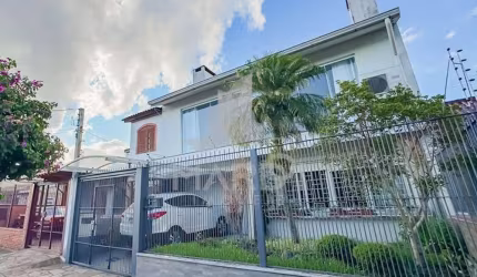 Casa com 4 quartos à venda na Rua Pedro Waine, 194, Santa Maria Goretti, Porto Alegre por R$ 835.000
