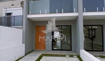 Casa com 2 quartos à venda na Rua Heitor Kramer, 704, Guarujá, Porto Alegre por R$ 449.000