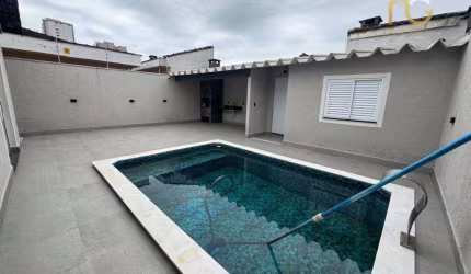 Casa com 4 dormitórios à venda, 164 m² por R$ 950.000,00 - Caiçara - Praia Grande/SP