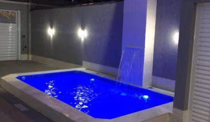 Sobrado com 3 dormitórios à venda, 151 m² por R$ 1.160.000,00 - Tupi - Praia Grande/SP
