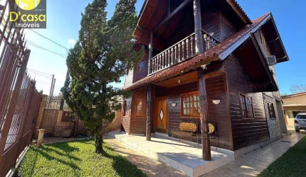 Belíssima casa com 4 dormitórios à venda, 223 m² por R$ 699.000 - Centro - Gravataí/RS