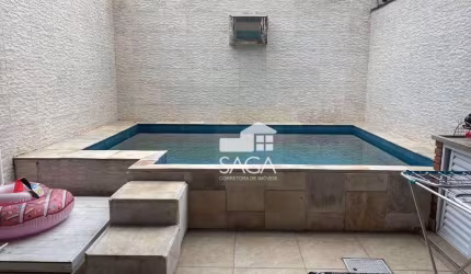Casa com 3 dormitórios à venda, 180 m² por R$ 930.000,00 - Vila Guilhermina - Praia Grande/SP