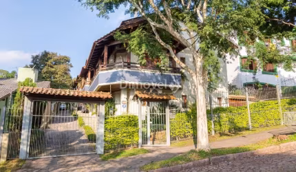 Casa em condomínio fechado com 3 quartos à venda na Rua Jaguari, 910, Cristal, Porto Alegre por R$ 780.000