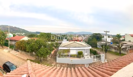 Casa com 3 quartos à venda na Avenida Doutor Francisco Roberto Dall Igna, 450, Espírito Santo, Porto Alegre por R$ 640.000