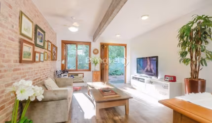 Casa em condomínio fechado com 3 quartos à venda na Avenida Coronel Marcos, 1334, Pedra Redonda, Porto Alegre por R$ 1.390.000