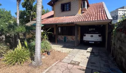 Casa com 3 quartos à venda na Rua Passo Fundo, 195, Centro, Esteio por R$ 980.000