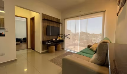 APARTAMENTO NO CENTRO COM 2 DORMITÓRIOS SENDO 1 SUÍTE, 1 BANHEIRO SOCIAL, VARANGA GOURMET COM CHURRASQUEIRA, 2 VAGAS DE GARAGEM