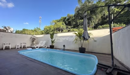 Casa em condomínio fechado com 3 quartos para alugar no Centro, Balneário Piçarras , 160 m2 por R$ 7.200