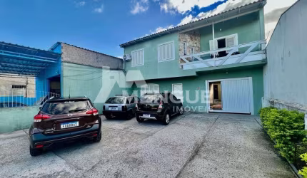 Casa com 5 quartos à venda na Rua Rodrigues da Costa, 34, Sarandi, Porto Alegre por R$ 950.000