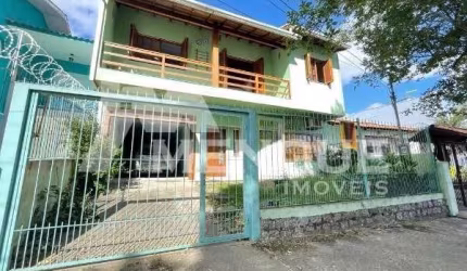 Casa com 4 quartos à venda na Avenida Salvador Leão, 648, Sarandi, Porto Alegre por R$ 850.000