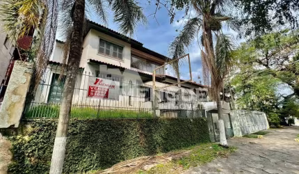 Casa com 3 quartos à venda na Avenida Quito, 415, Jardim Lindóia, Porto Alegre por R$ 1.500.000