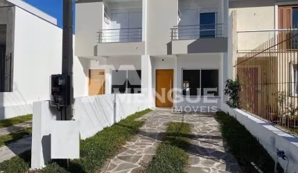 Casa com 3 quartos à venda na Rua Itacyr Rossi, 195, Guarujá, Porto Alegre por R$ 499.000