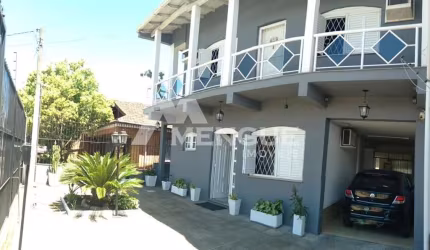 Casa com 5 quartos à venda na Avenida Souza Melo, 970, Sarandi, Porto Alegre por R$ 490.000